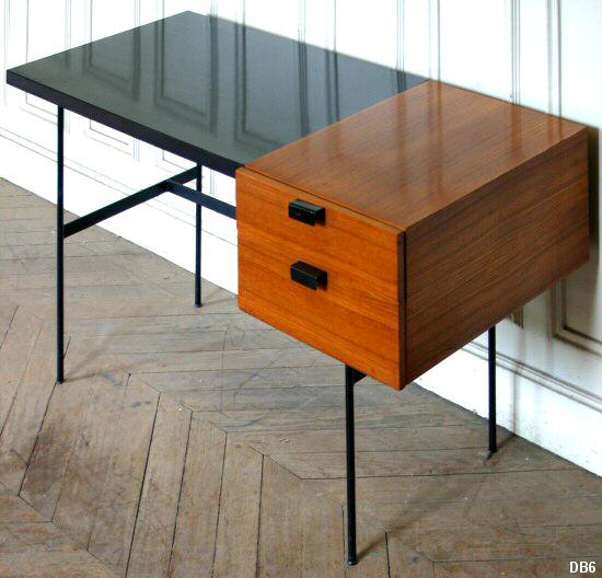 Bureau "PAULIN" CM141, dit par Thonet en 1953, plateau plaqu de formica noir, caisson  2 tiroirs en placage de teck, pitement en acier laqu noir.