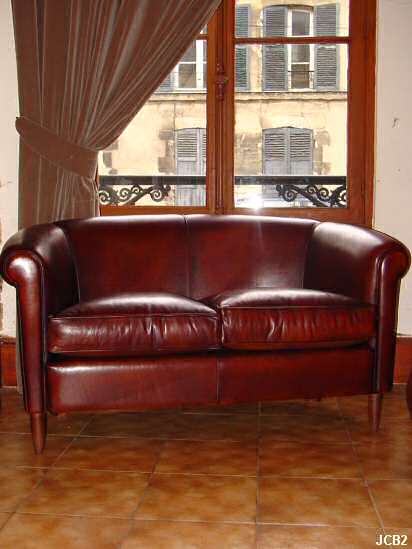 Banquette Bridge vers 1925 beau modle Art-Dco, peausserie neuve, coussins garniture plumes, coloris: marron.